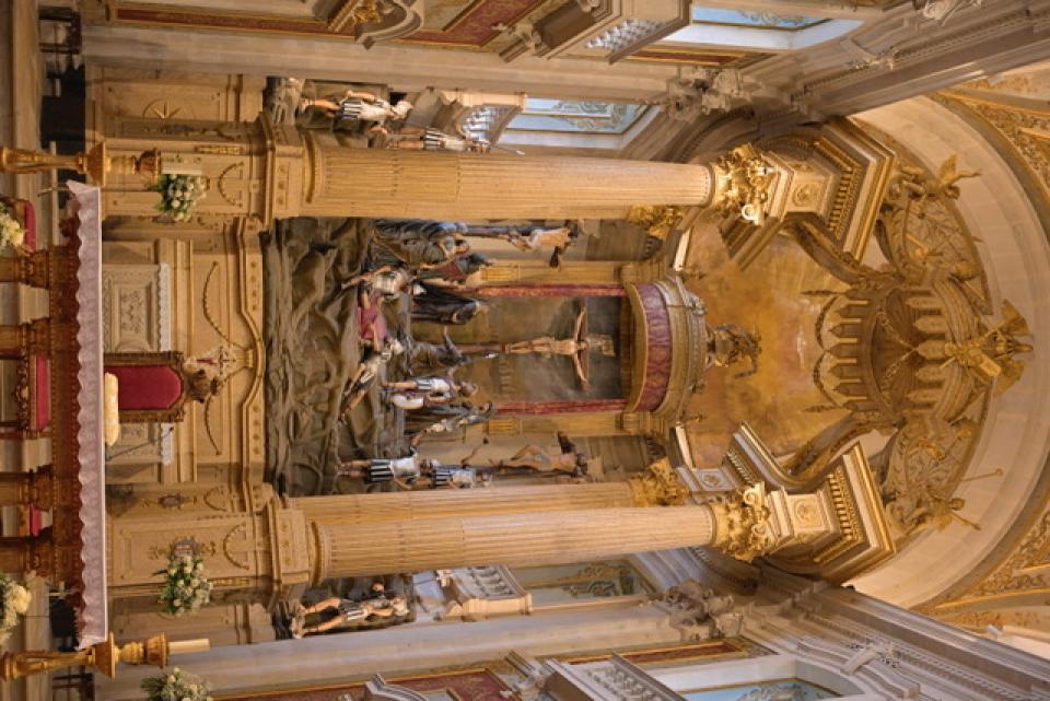 Check out this depiction of Calvary behind the altar